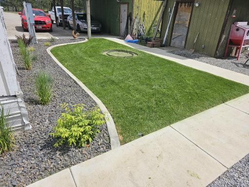 After Low-Maintenance Landscape, Irrigation & Sod Installation in Chattaroy, WA