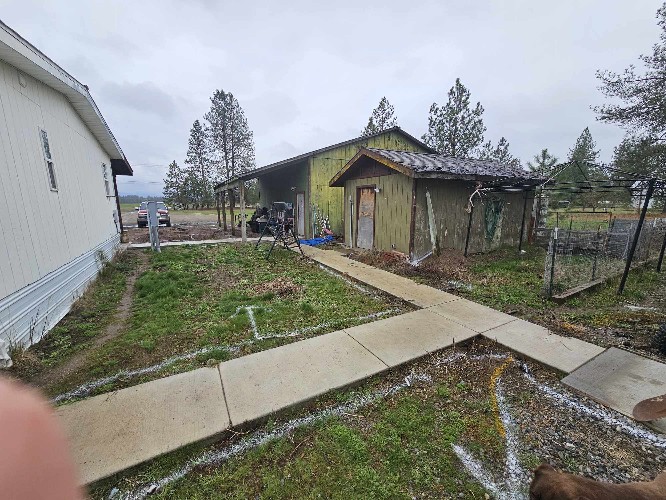 Before Low-Maintenance Landscape, Irrigation & Sod Installation in Chattaroy, WA